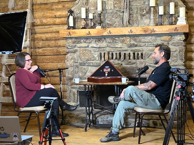 Veterans sharing combat experiences during a recorded discussion, part of a veteran non profit initiative supporting veteran mental health and wartime reflection.